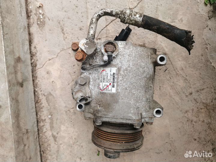 Компрессор кондиционера Mitsubishi Lancer 9