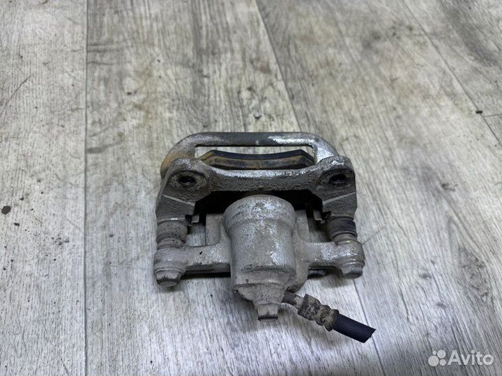 Суппорт задний правый Chevrolet Lacetti J200 F14D3