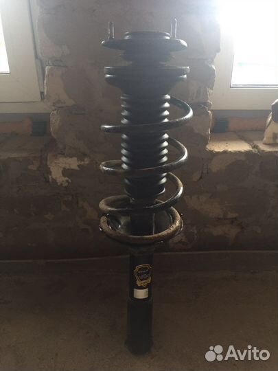Стойка амортизатора передняя geely mk