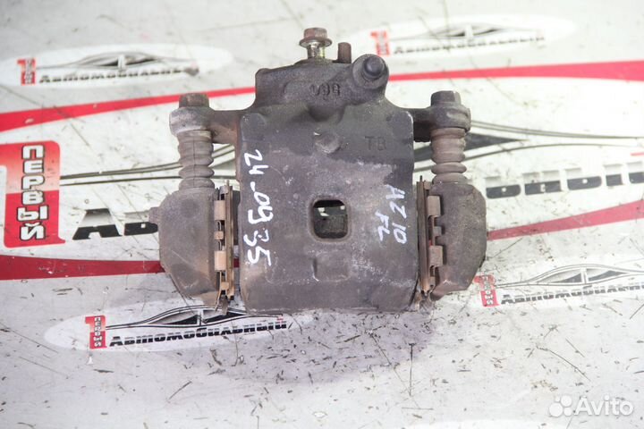 Суппорт перед лево c Nissan Cube Z10 CG13DE