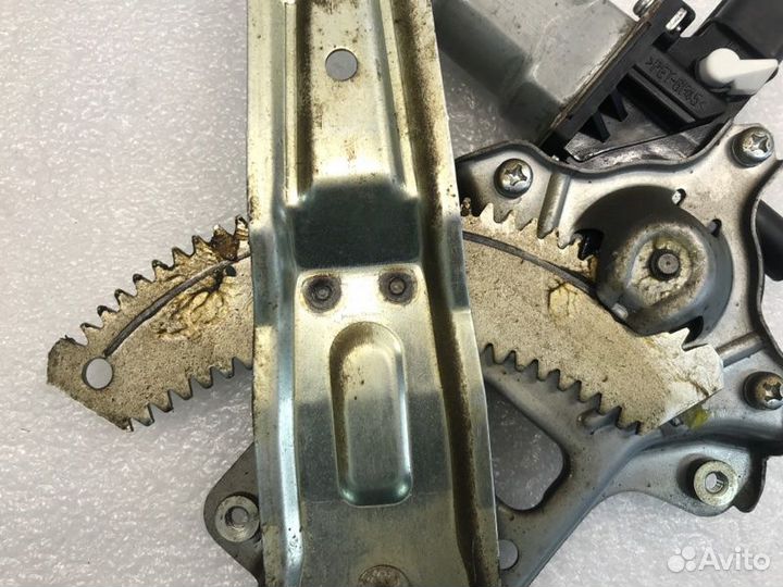 Мотор стеклоподъемника задний левый Mitsubishi