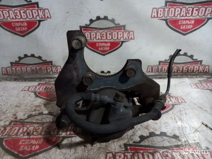 Суппорт тормозной передний левый Toyota Lite Ace