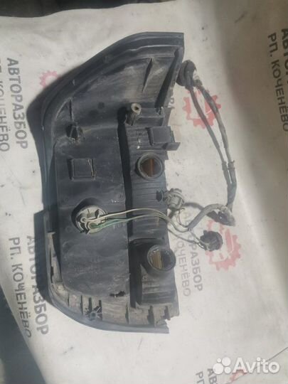 Фонарь заднего хода задний левый Toyota Corolla