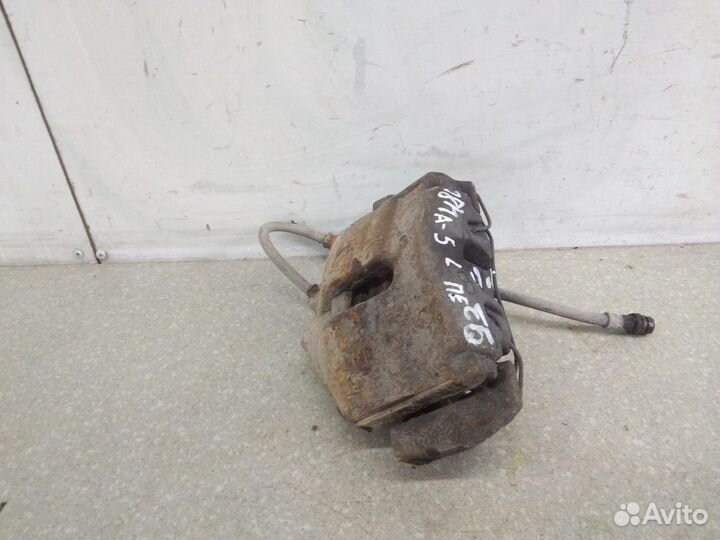 Суппорт передний левый Skoda Octavia (A5 1Z) 2004