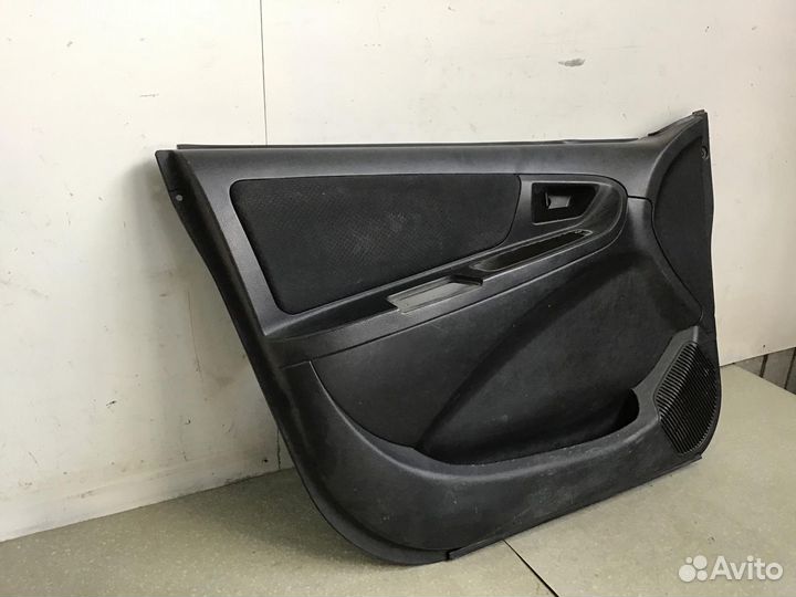 Обшивка двери передней левой Geely MK 2008