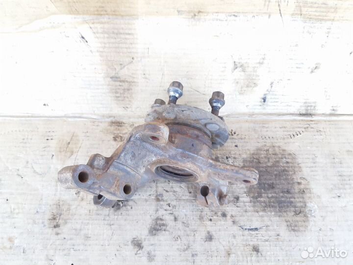 Кулак поворотный передний левый Мазда 626 ге