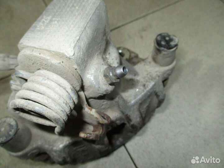 Суппорт задний левый Ford Focus 3