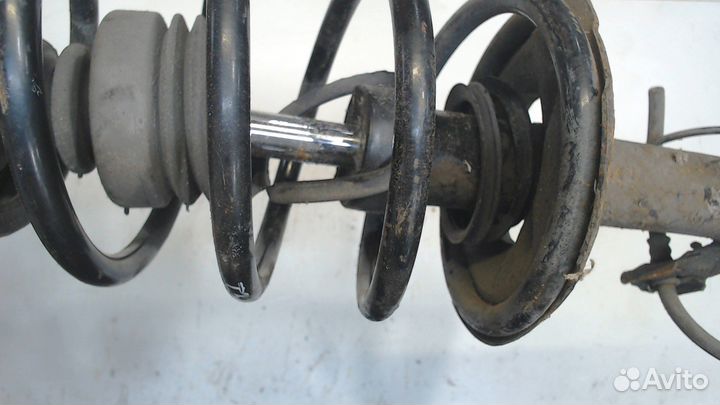 Амортизатор подвески Nissan Almera N16, 2005