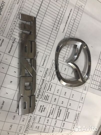 Логотип,шильдик Mazda