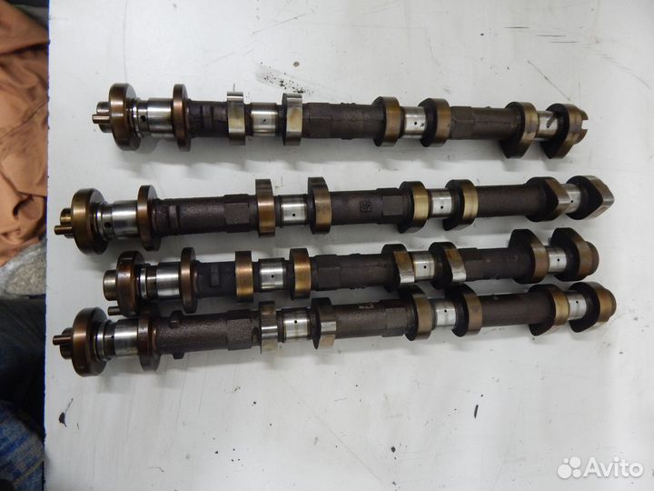 Распредвал Nissan VQ20