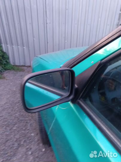 Зеркало левое Skoda Felicia 1.6л мт 1998г