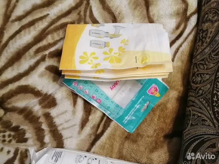 Подгузники, прокладки для груди, пакеты для молока
