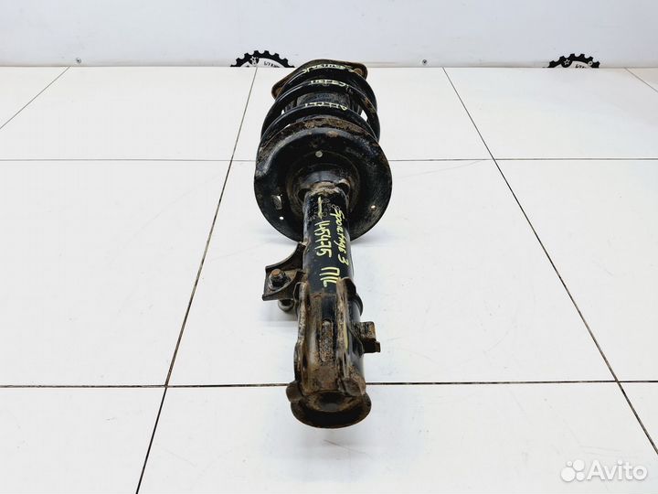 Амортизатор передний левый Kia Sportage III (SL)