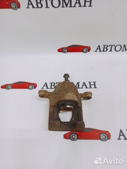 Суппорт задний правый Nissan Qashqai (J10)