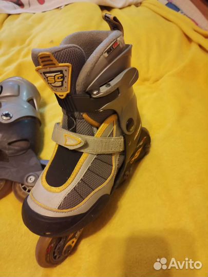 Роликовые коньки