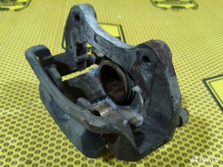 Суппорт тормозной передний левый Opel Insignia