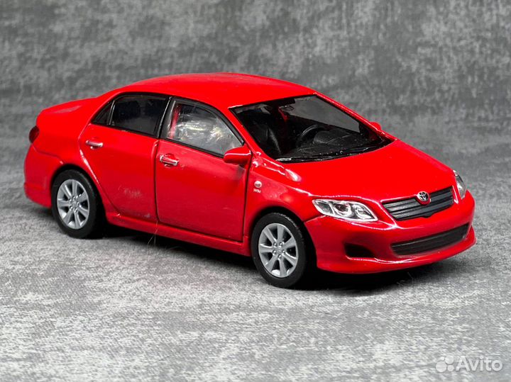 Моедль toyota corola 1/36 welly