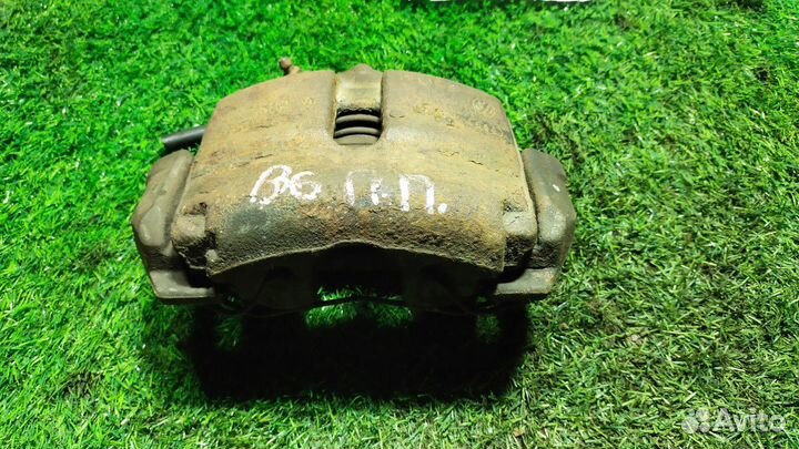 Суппорт тормозной Volkswagen Passat (B6) VI