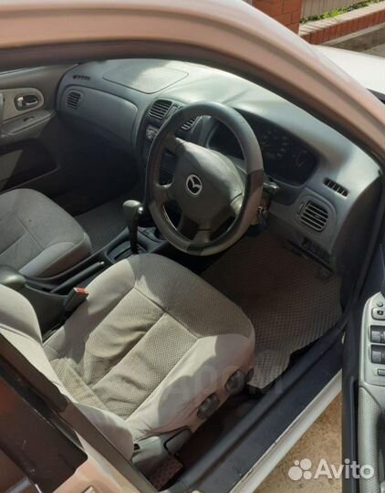 Mazda Familia 1.5 AT, 1999, 161 557 км
