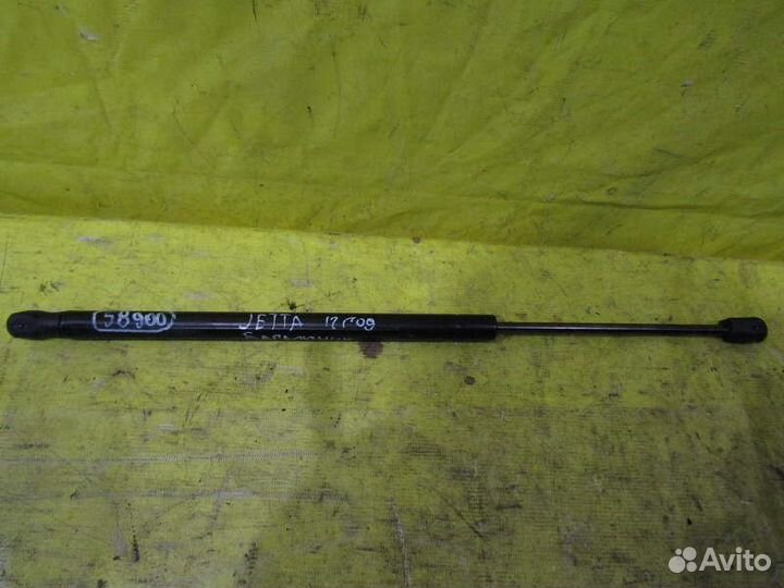 Амортизатор крышки багажника Jetta 10-14г 58900