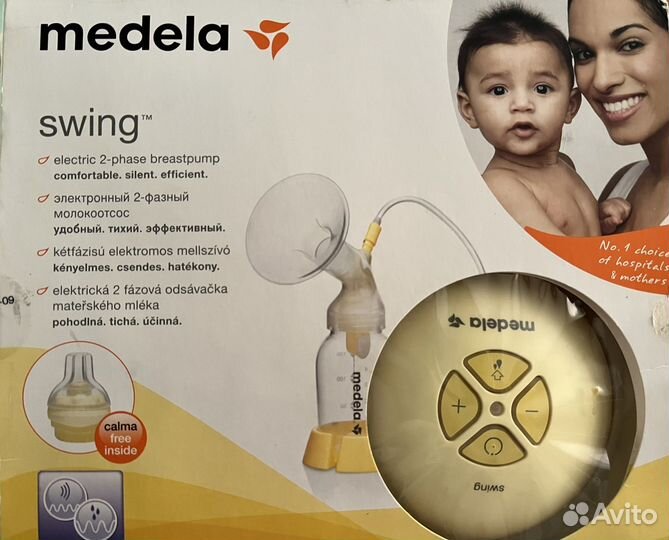 Молокоотсос medela электрический