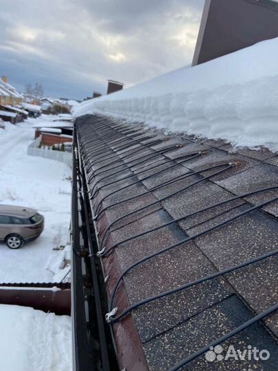 Помощник монтажника обогрева водостоков кровли