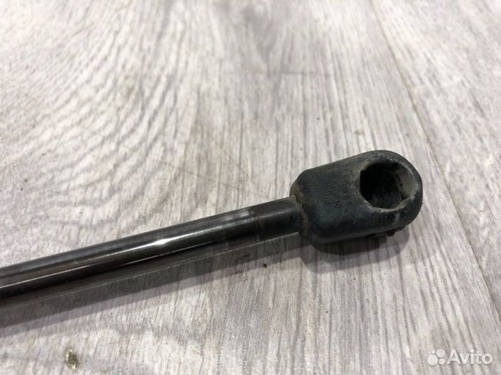 Амортизатор крышки багажника Mitsubishi Lancer 10