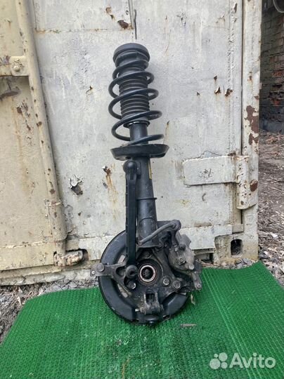 Амортизатор передний левый Opel Astra J