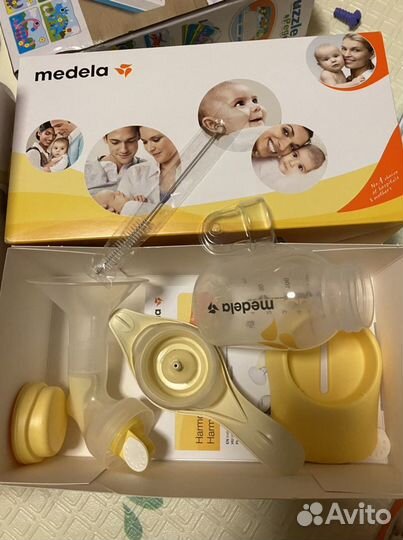 Молокоотсос ручной медела medela 2-х фазный
