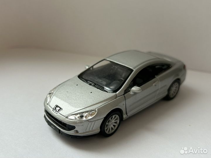 Модель автомобиля welly peugeot 407 coupe