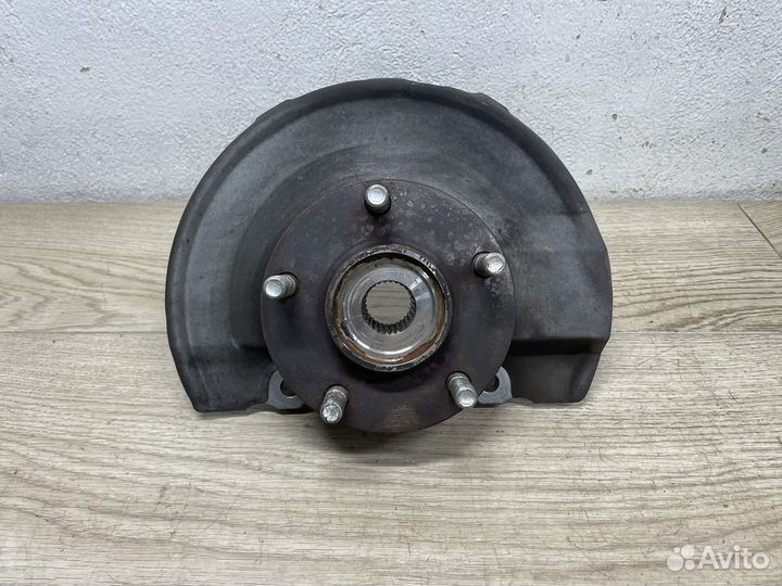 Кулак левый передний Mitsubishi Lancer 10