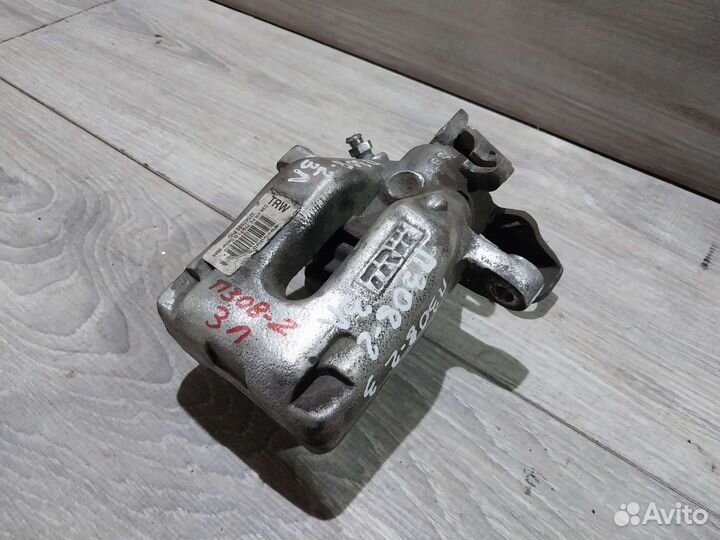 Суппорт задний левый Peugeot 308