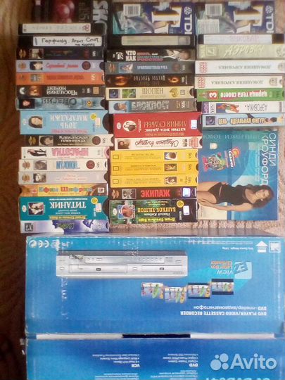 Видеокассеты с фильмами и домашней аэробикой
