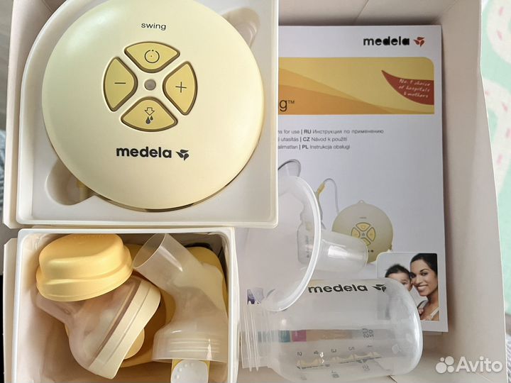 Молокоотсос medela электрический