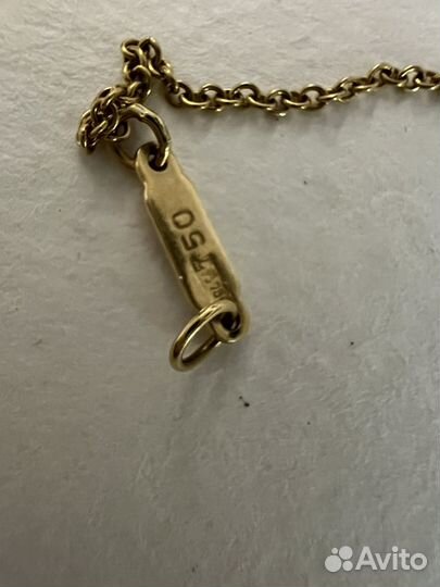 Золотая пoдвеска Tiffany&Co