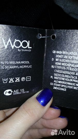 Шерстяной свитер с высоким горлом