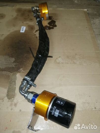 Вынос масляного фильтра на двигатель к6а Сузуки