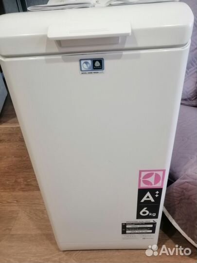 Стиральная машина с вертикальной загрузкой