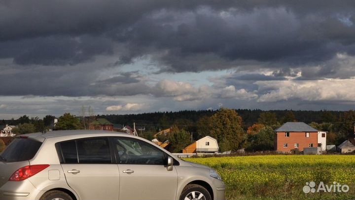 Заднее стекло на Nissan Tiida хэтчбек