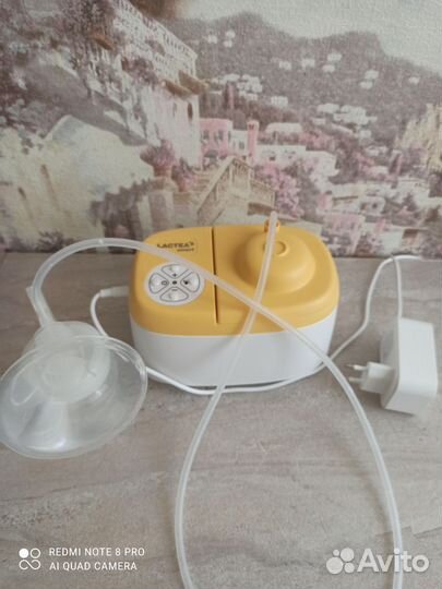 Молокоотсос электрический новый