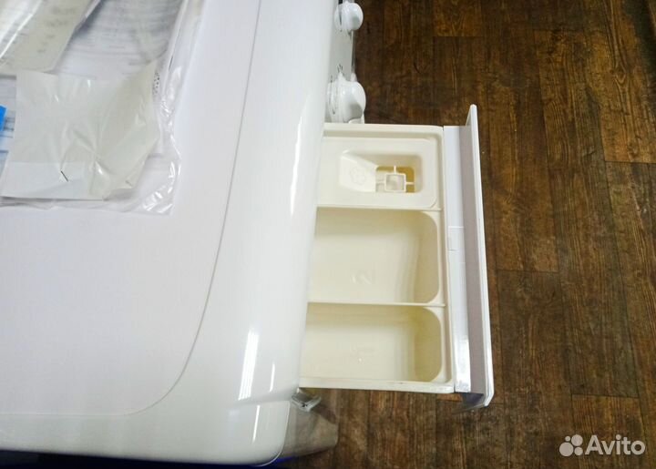 Новая стиральная машинка с баком