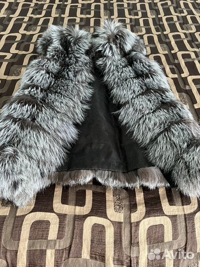 Жилетка меховая женская
