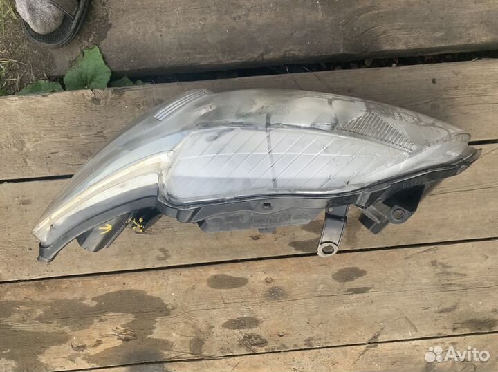 Фара левая Toyota Corolla E15