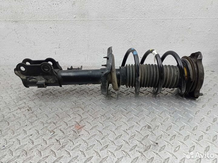 Амортизатор передний L Kia Sportage 4 QL