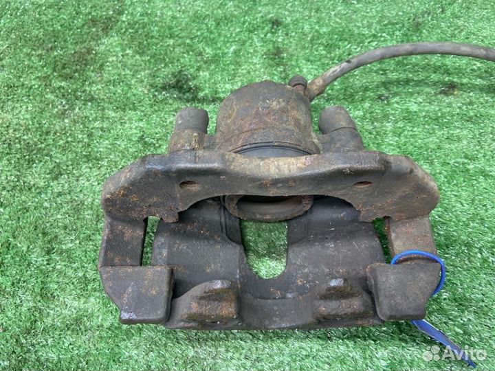 Тормозной суппорт передний правый Ford Focus 2