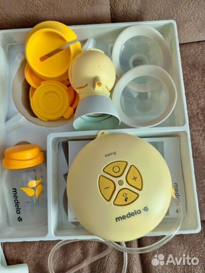 Молокоотсос medela электрический