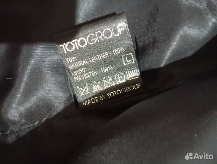 Кожаное женское пальто с норкой