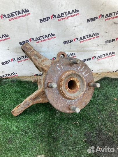 Кулак поворотный передний правый Mitsubishi Lancer