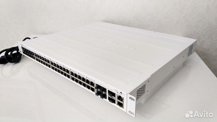 Коммутатор Mikrotik CRS354-48P-4S+2Q+RM