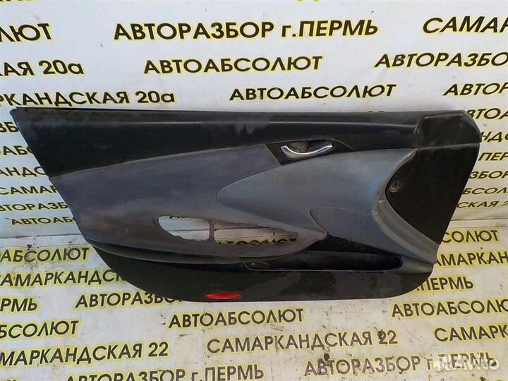 Обшивка двери передней левой Nissan Primera (P12)